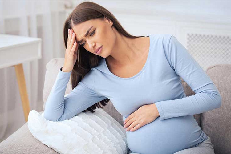 Vì sao mẹ bầu lại bị đau đầu khi mang thai? 1